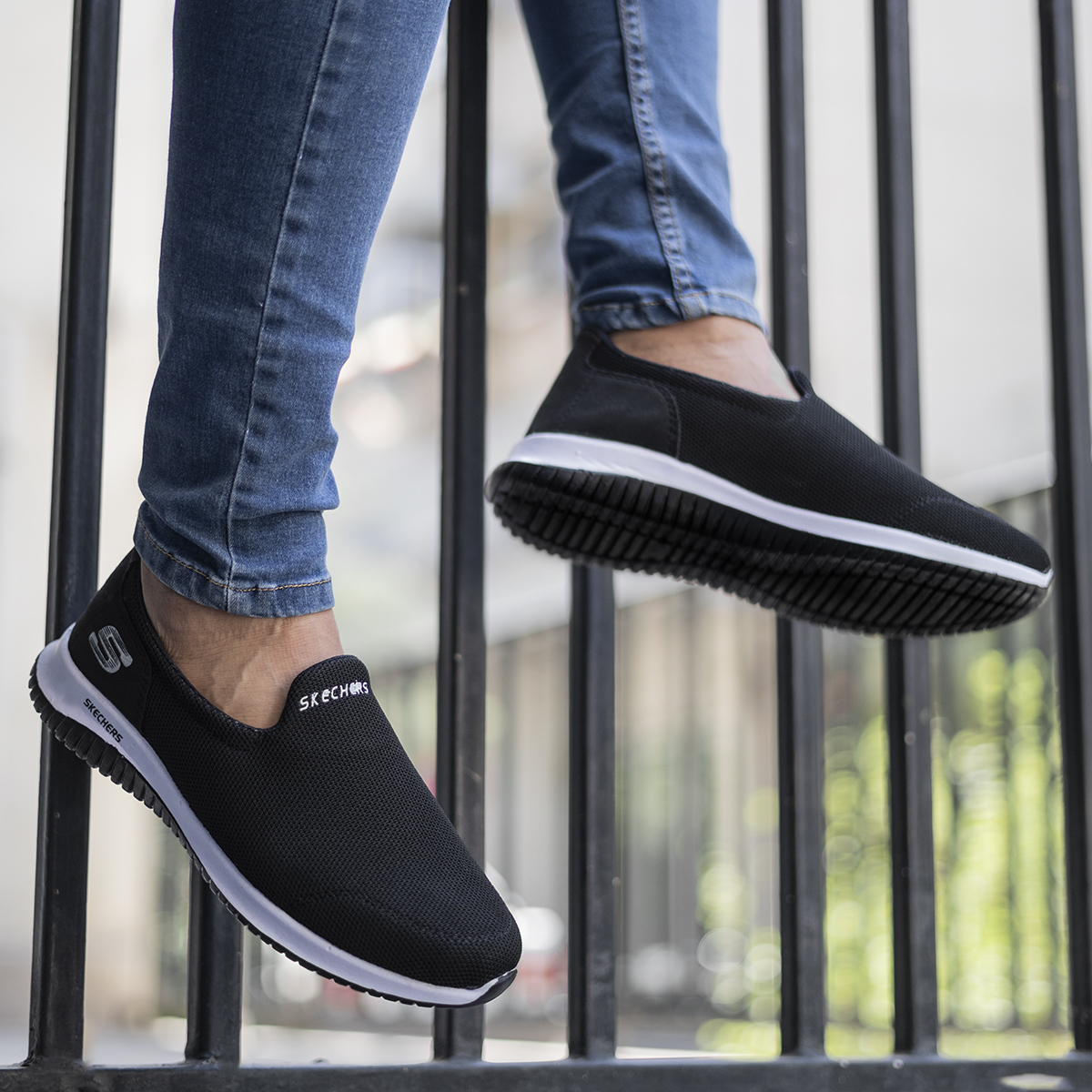 کفش ورزشی اسکیچرز مردانه مشکی مدل Tarok