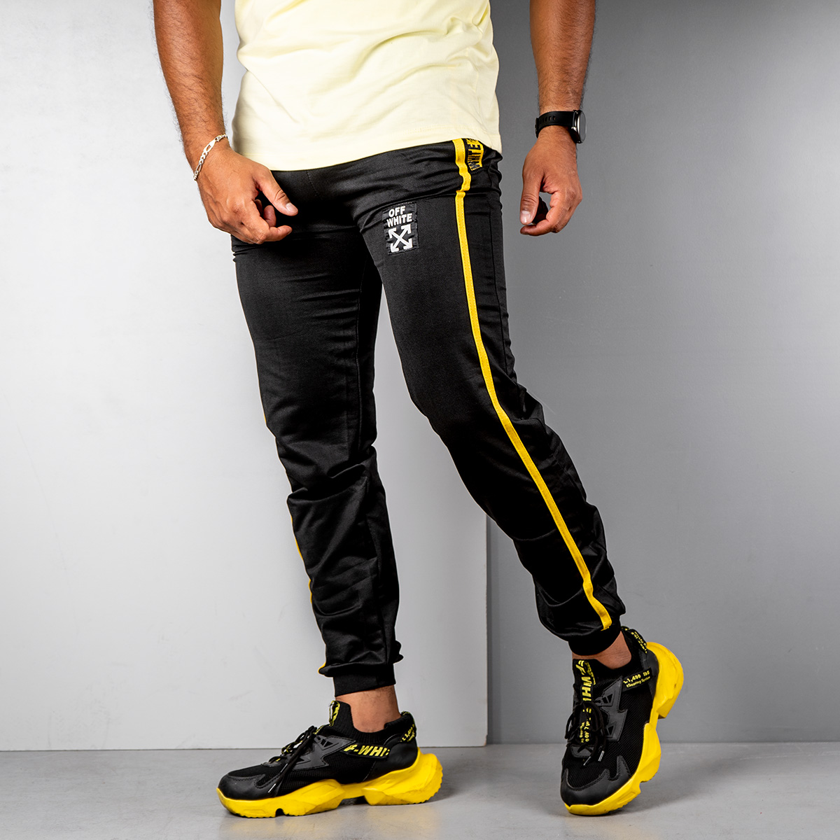 شلوار اسلش مردانه مشکی زرد مدل P62(T)