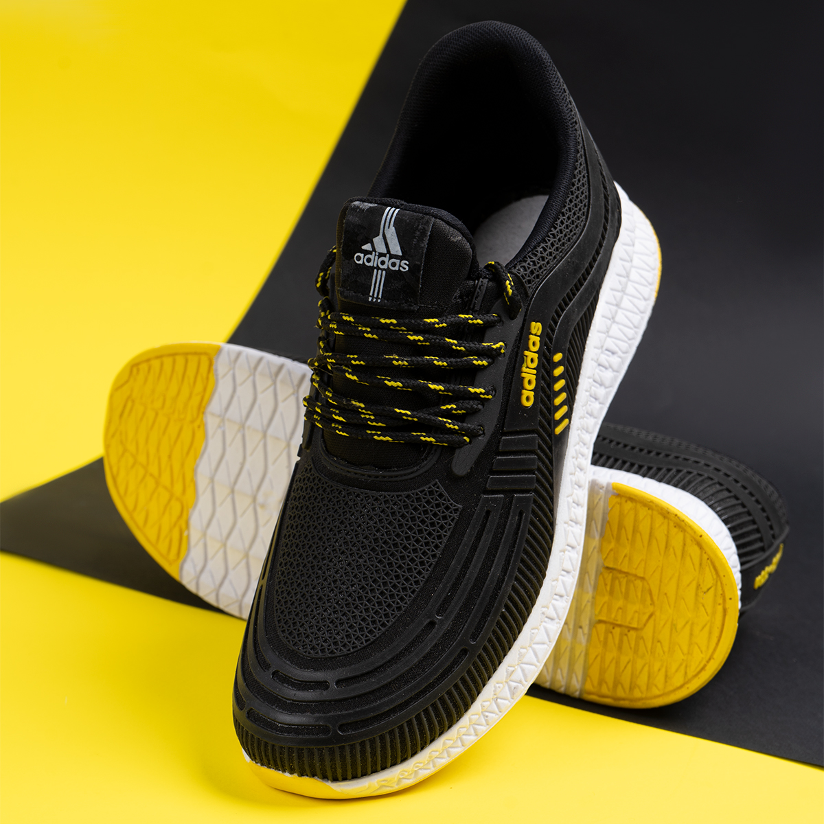 کفش ورزشی Adidas مردانه مشکی زرد مدلPardad