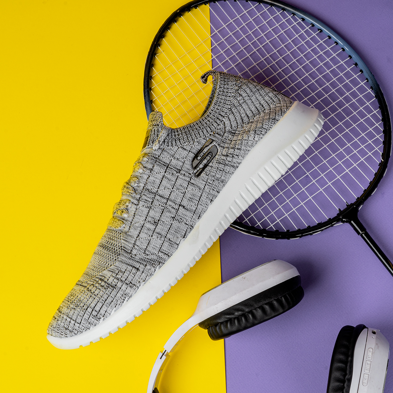 کفش ورزشی اسکیچرز مردانه طوسی طرحدار مدلE55