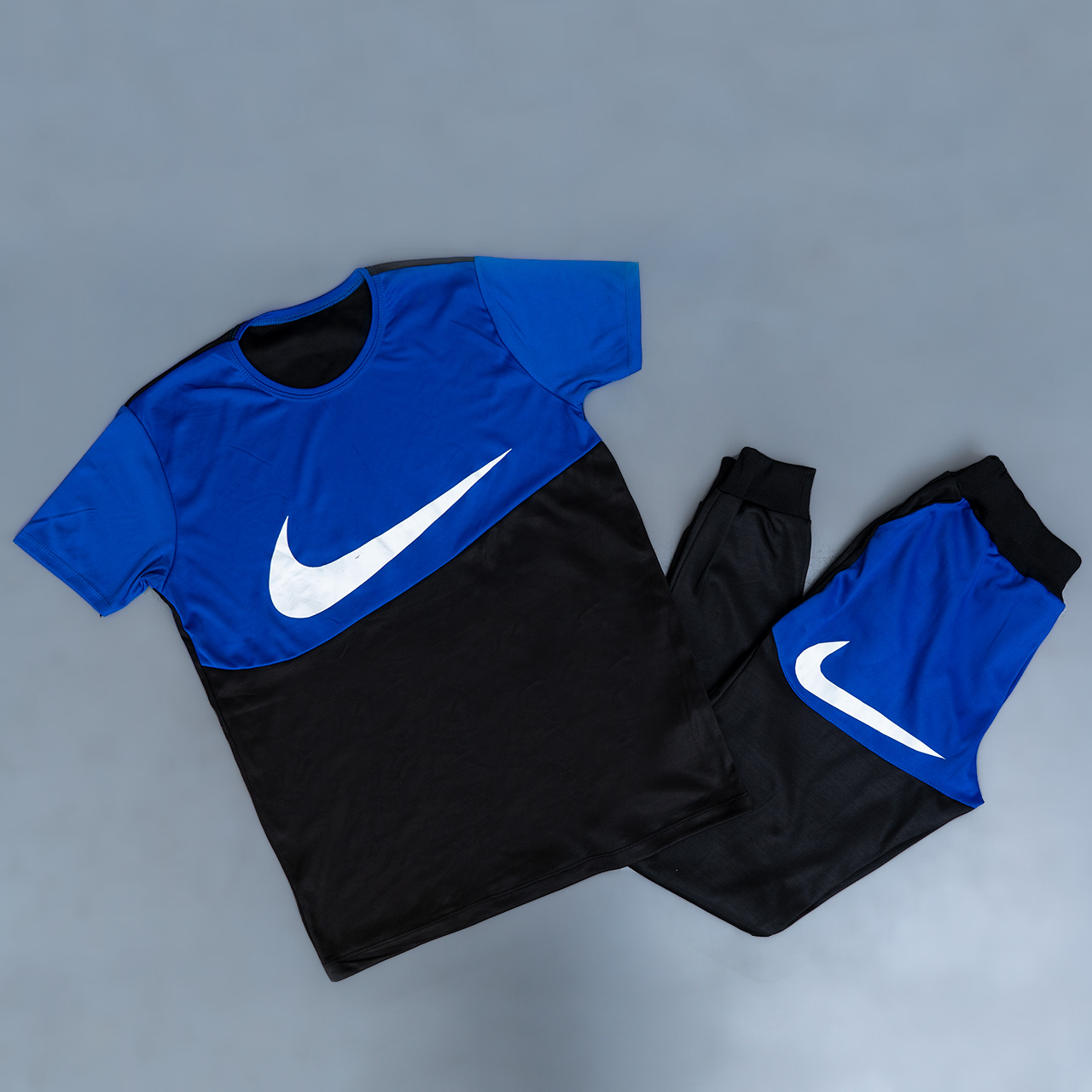 ست تیشرت شلوار نایک مشکی آبی مردانه مدلMs2