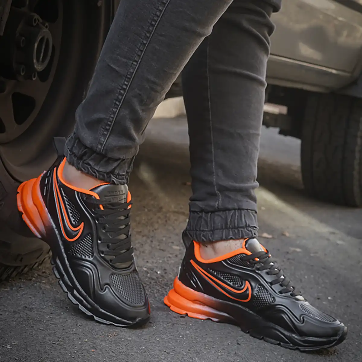 کفش ورزشی مردانه مشکی نارنجی مدل Arona