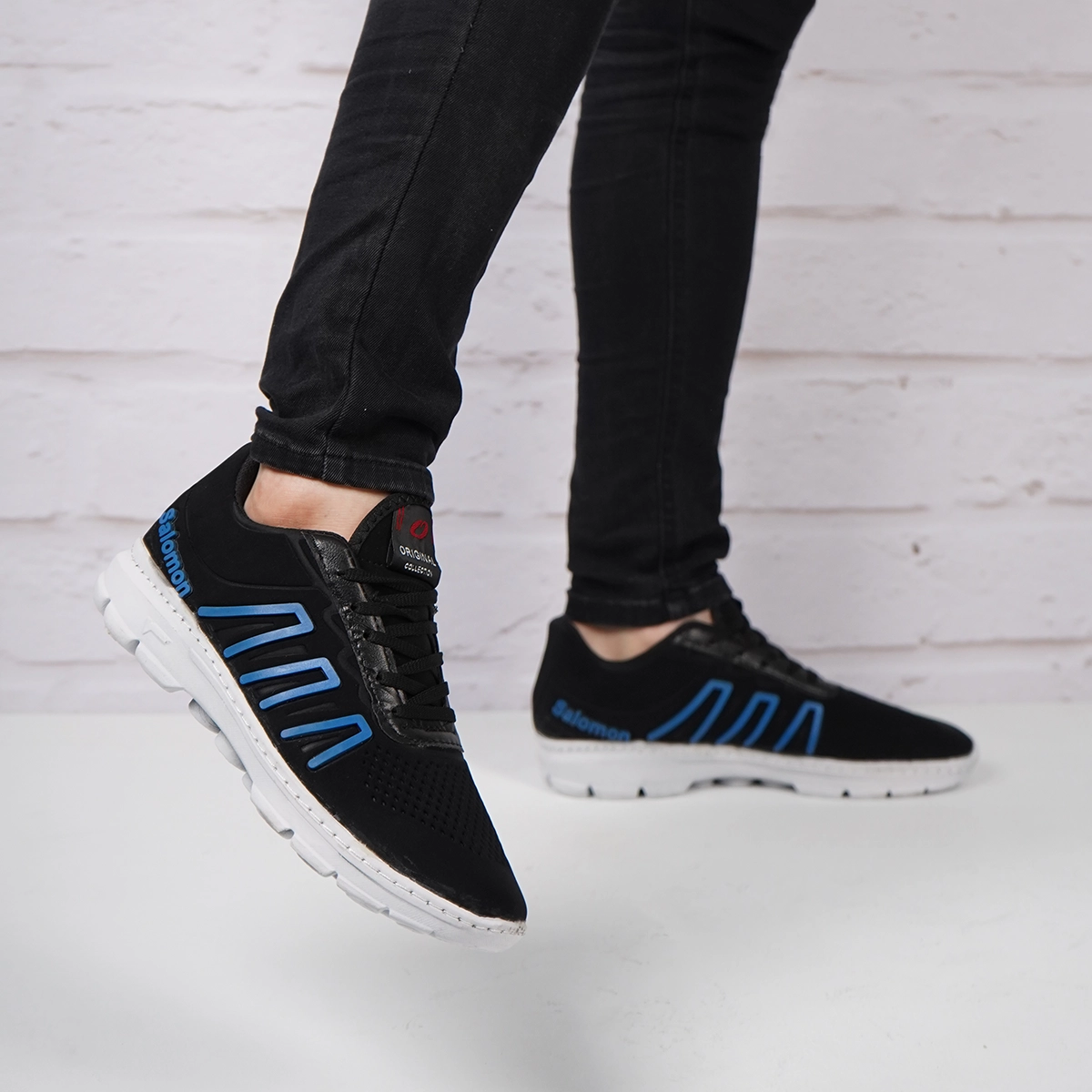 کفش ورزشی مردانه سالامون مشکی آبی مدل U200