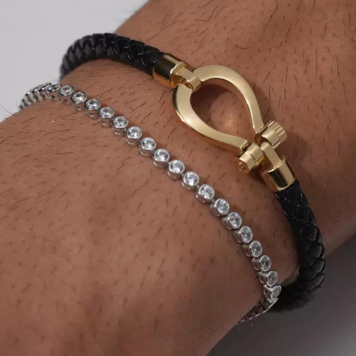 دستبند اسپرت امگا مشکی طلایی