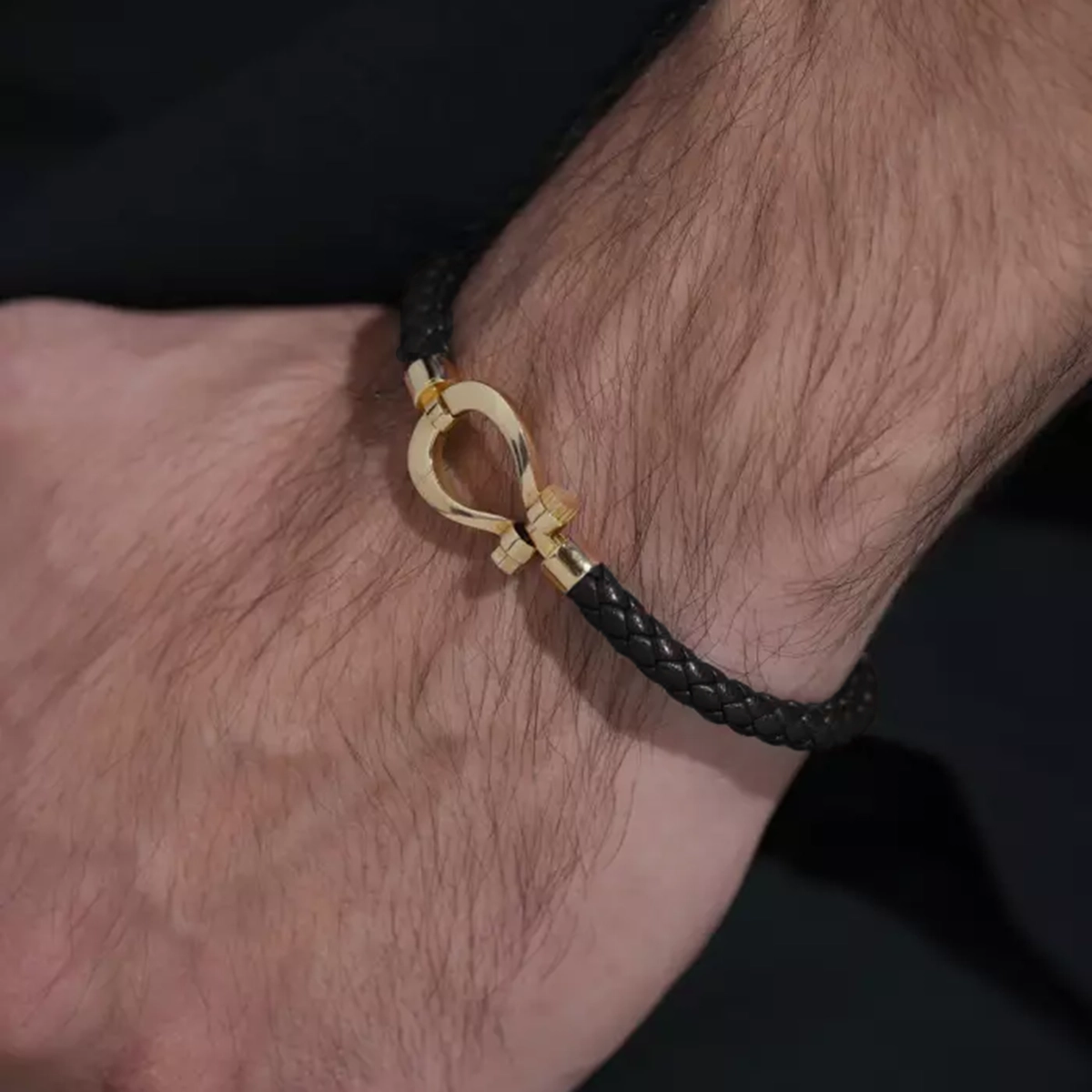 دستبند اسپرت امگا مشکی طلایی