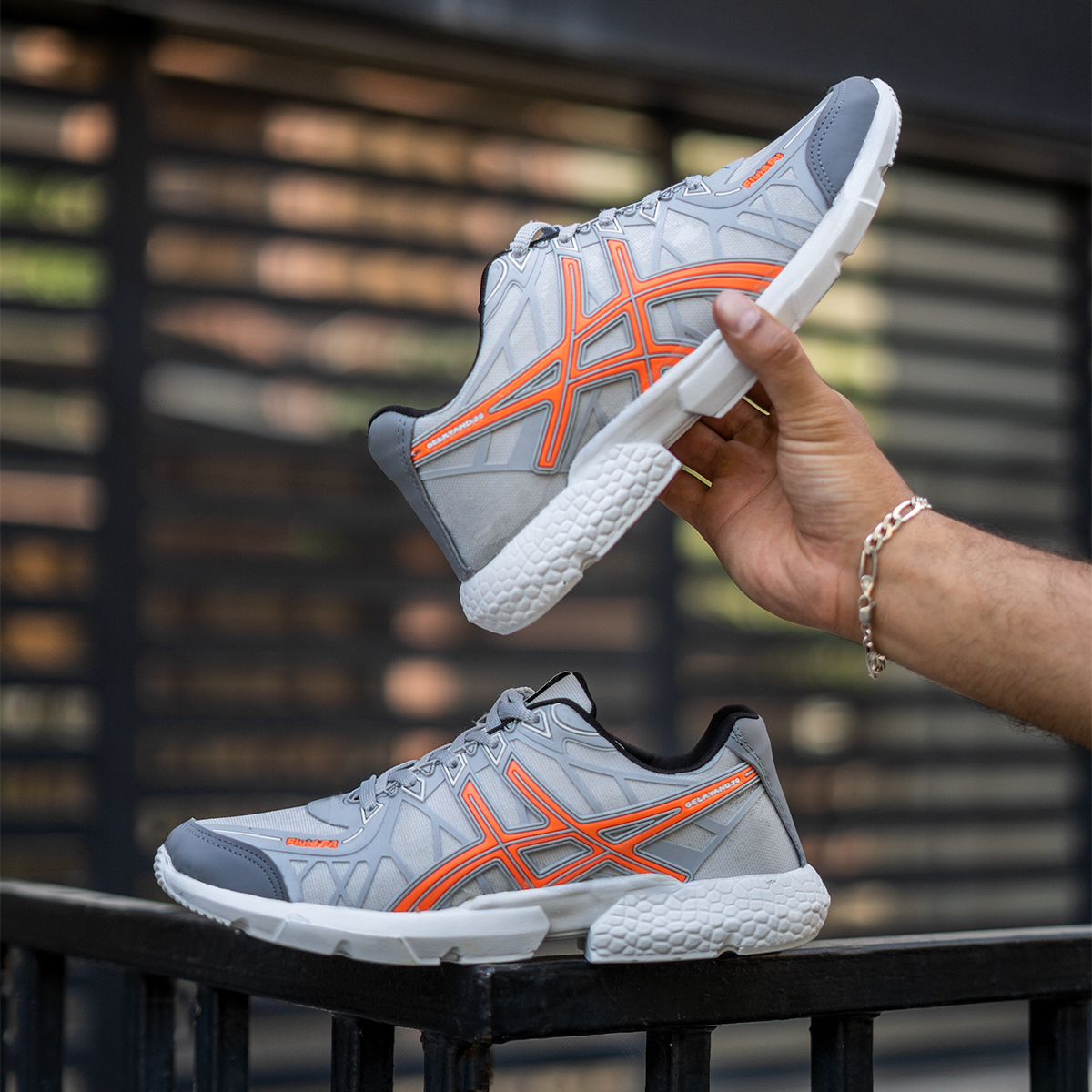 کفش ورزشی Asics مردانه طوسی نارنجی مدل Snopy